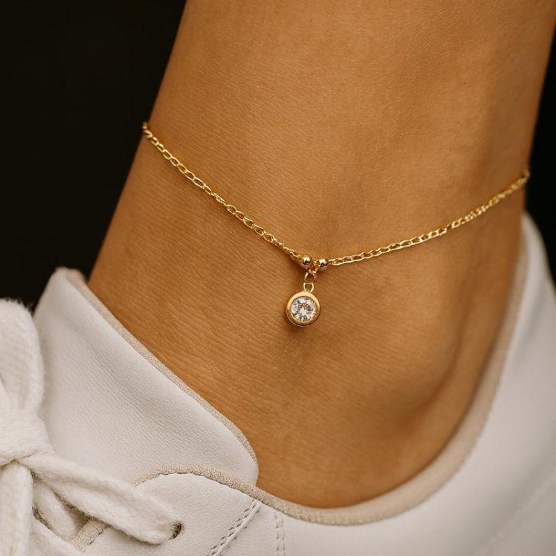 Tornozeleira com Pingente Ponto de Luz 21cm + 5cm Extensor Banhado a Ouro 18k