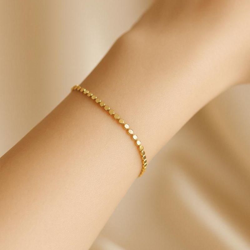 Pulseira Mini Bolinhas Achatadas 15cm + 5cm Banhado a Ouro 18k