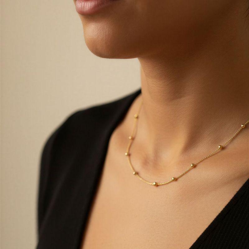 Choker Microbolinhas com bolas 1,2mm 30cm + 10cm Extensor Banhada a Ouro 18k